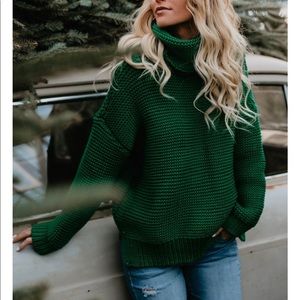 Green turtleneck sweater